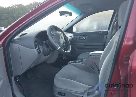 2000 Ford Taurus Se z USA, uszkodzony, nr VIN 1FAFP5324YA204876